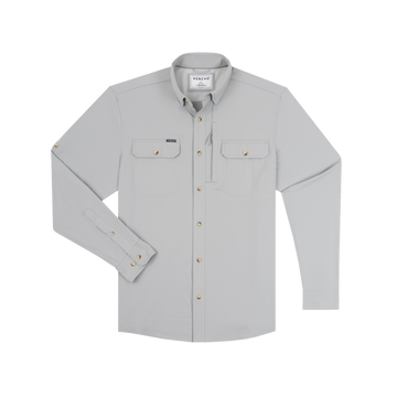 The Grey Ghost long sleeve button-up shirt in light grey with two chest pockets and brass buttons.