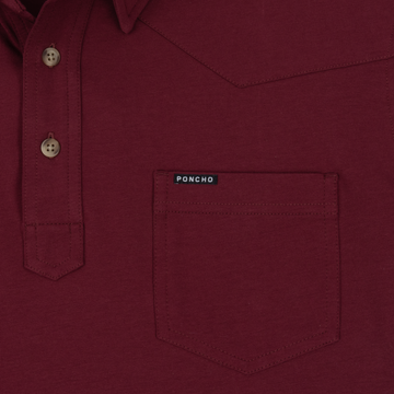 Close-up of burgundy shirt pocket with Poncho label from The Gridiron