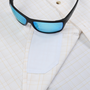 The Biloxi white plaid shirt styled with blue tinted sunglasses