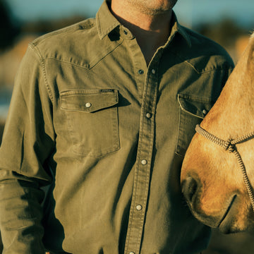 man with horse wearing the hidalgo shirt
