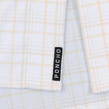 The Pascagoula white plaid shirt detail with Poncho label