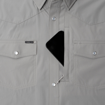 phone in chest zipper pocket of shirt