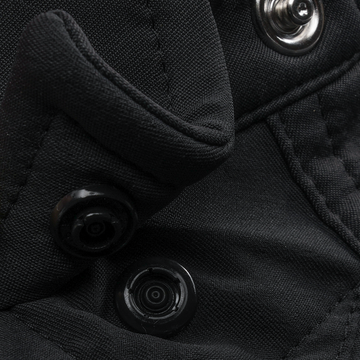 Close-up of black fabric with buttons on The Jake shirt