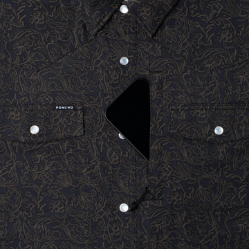 phone in chest zipper pocket of shirt