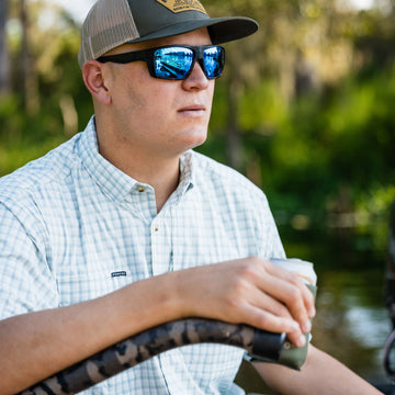 man with beverage on water