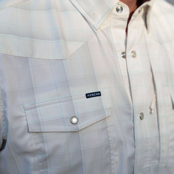 man wearing the whitefish shirt