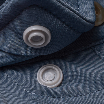 Close-up of snap buttons on The Little Tuna shirt fabric