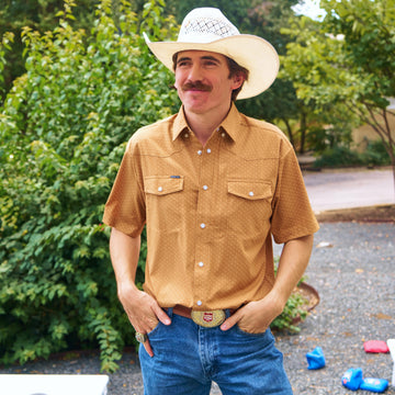 man with cowboy had wearing clyde short sleeve pearl snap shirt