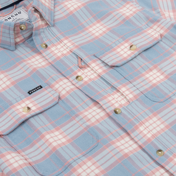 The Madaket shirt in soft blue and pink plaid with buttoned chest pockets and a classic collar detail