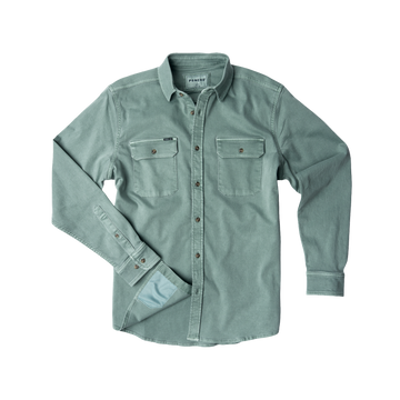 The Mentone long-sleeve shirt in muted green with buttoned chest pockets, perfect for outdoors enthusiasts.