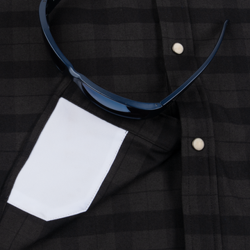 The North Rim black plaid outdoor shirt with pearl snap buttons and chest pocket styled with sunglasses