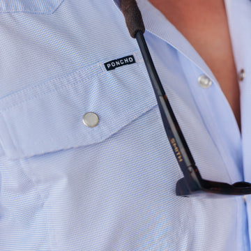 closeup of man wearing the padre shirt