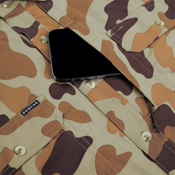 phone in chest zipper pocket of camo shirt