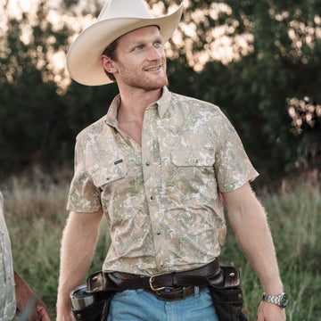 man wearing south texas camo shirt