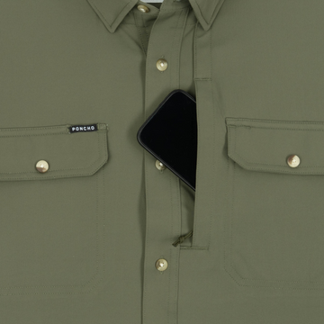 Phone in chest zipper pocket of shirt