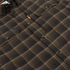 The Rusty Saw plaid shirt with buttoned chest pockets and Poncho Outdoors label