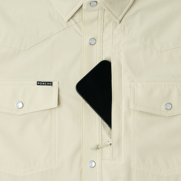 phone in chest zipper pocket of shirt