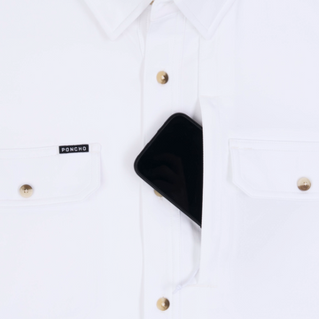 Phone in chest zipper pocket of shirt