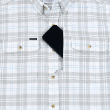 The Snowcat men's outdoor shirt in light gray blue and white plaid with chest pockets and button down collar