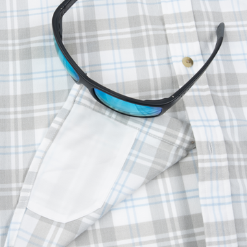 The Snowcat gray white and blue plaid mens outdoor shirt with chest pocket and sunglasses