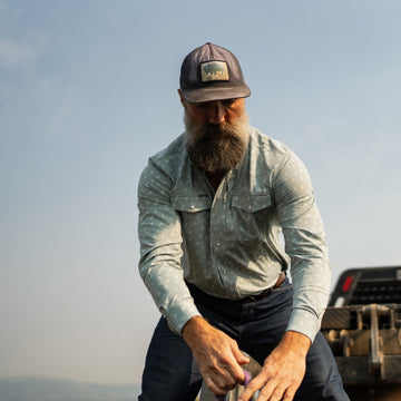Man wearing The St. Helens shirt outdoors with a truck in the background