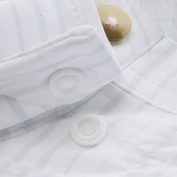 Closeup of collar snaps on collar of shirt