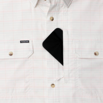 phone in chest zipper pocket of shirt