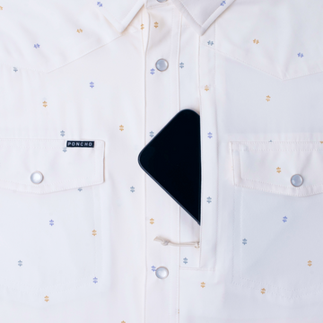 phone in chest zipper pocket of shirt