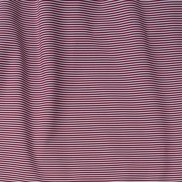 The Top Row shirt featuring a bold red and white horizontal stripe pattern
