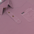 The Top Row red and white striped shirt with button placket and Poncho label