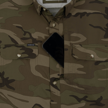 Phone in chest zipper pocket of shirt