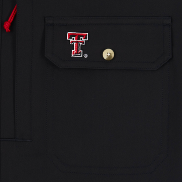 closeup of logo on pocket of shirt