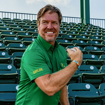 man wearing baylor green shirt