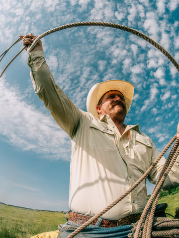 Man roping while wearing The Workhorse shirt
