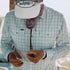 man inspecting fly in the Boca Grande shirt