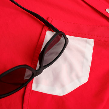 closeup of red shirt sunglasses cleaner