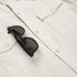 Detail shot of white denim shirt with sunglasses holder