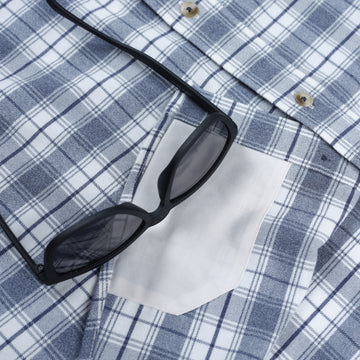 sunglasses on blue plaid shirt
