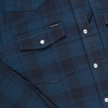 close up of blue and black western flannel