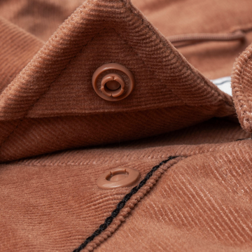 closeup of collar snaps on shirt