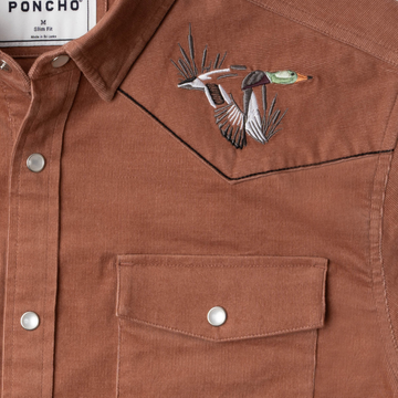 closeup of duck logo on shirt with pocket