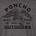 Eagle carrying a fish with the words Poncho Outdoors Wild Free TX US on a dark fabric background