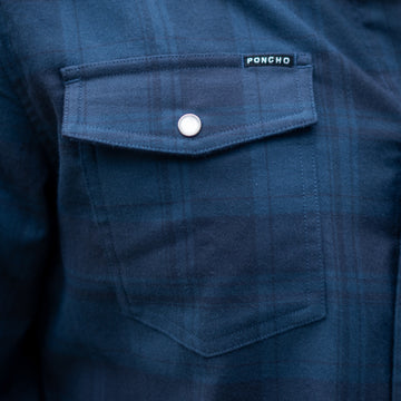 pocket with pearl snap on blue plaid flannel shirt