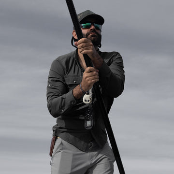 Man wearing Solid black long sleeve shirt