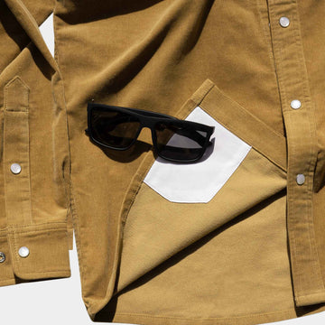 lens cloth on bottom of shirt