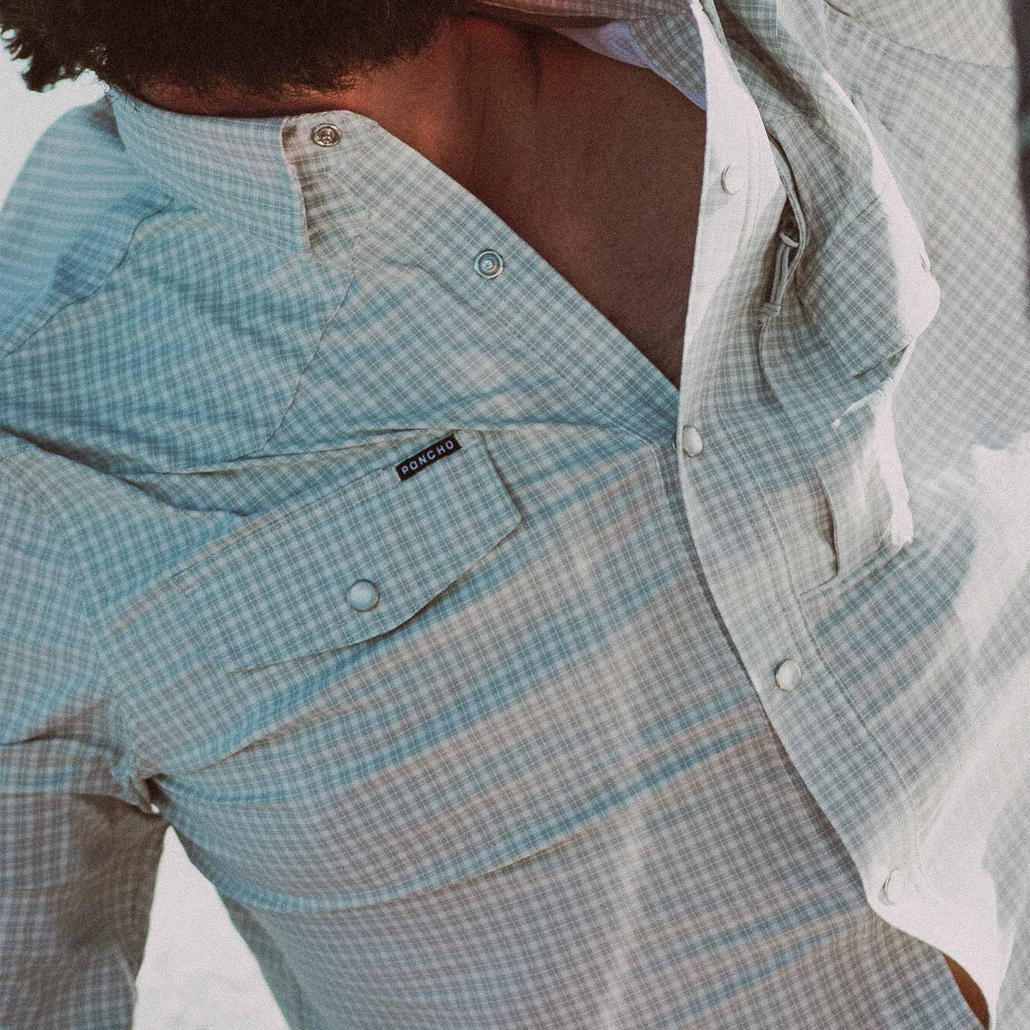 closeup of chest of man wearing shirt