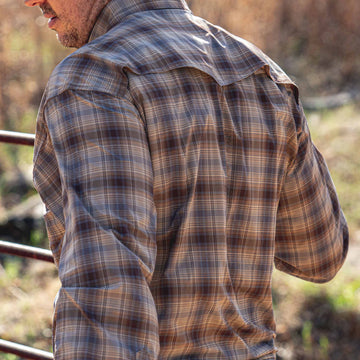 back of brown blue plaid shirt