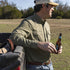 Long sleeve green western shirt  man with beer by truck