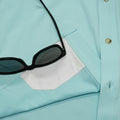 Aqua green shirt long sleeve lens cleaner close up