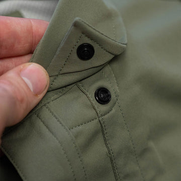 Close up of collar snap button